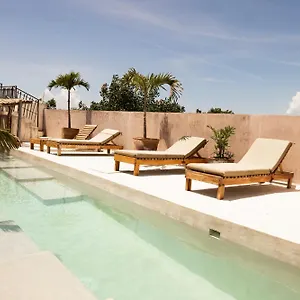 https://koos-hotel-botique-tulum.quintano-roohotels.com